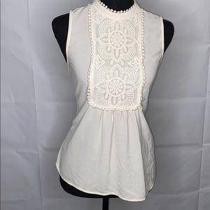 White sleeveless blouse